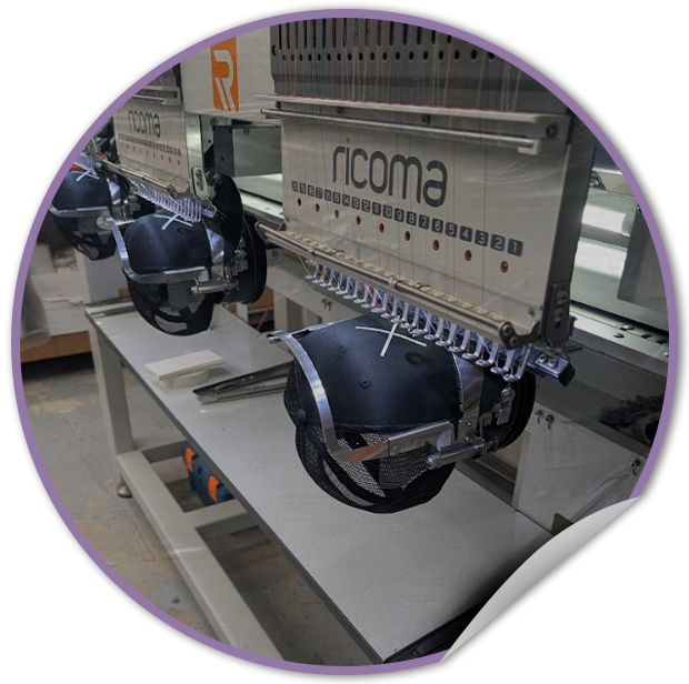 TVP NYC Embroidery machine with 'Ricoma' branding in a workshop setting