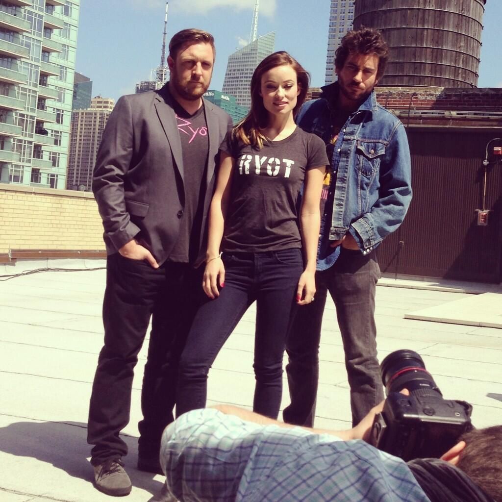 Olivia Wilde, Bryn Mooser, and David Darg wearing the original RYOT news gear